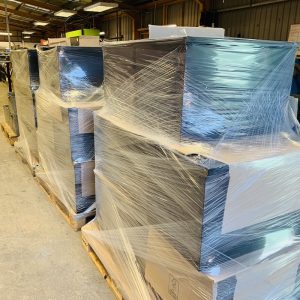 The first batch of metal boxes to form an iparcelBox smart parcel delivery box at the factory, wrapped up on pallets ready for shipping.