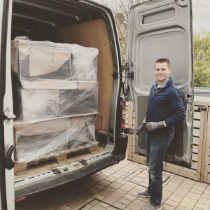 Unloading a transit van containing the first batch of metal boxes, into which the electronics would be added for the first trial batch of iParcelBox smart parcel delivery boxes.